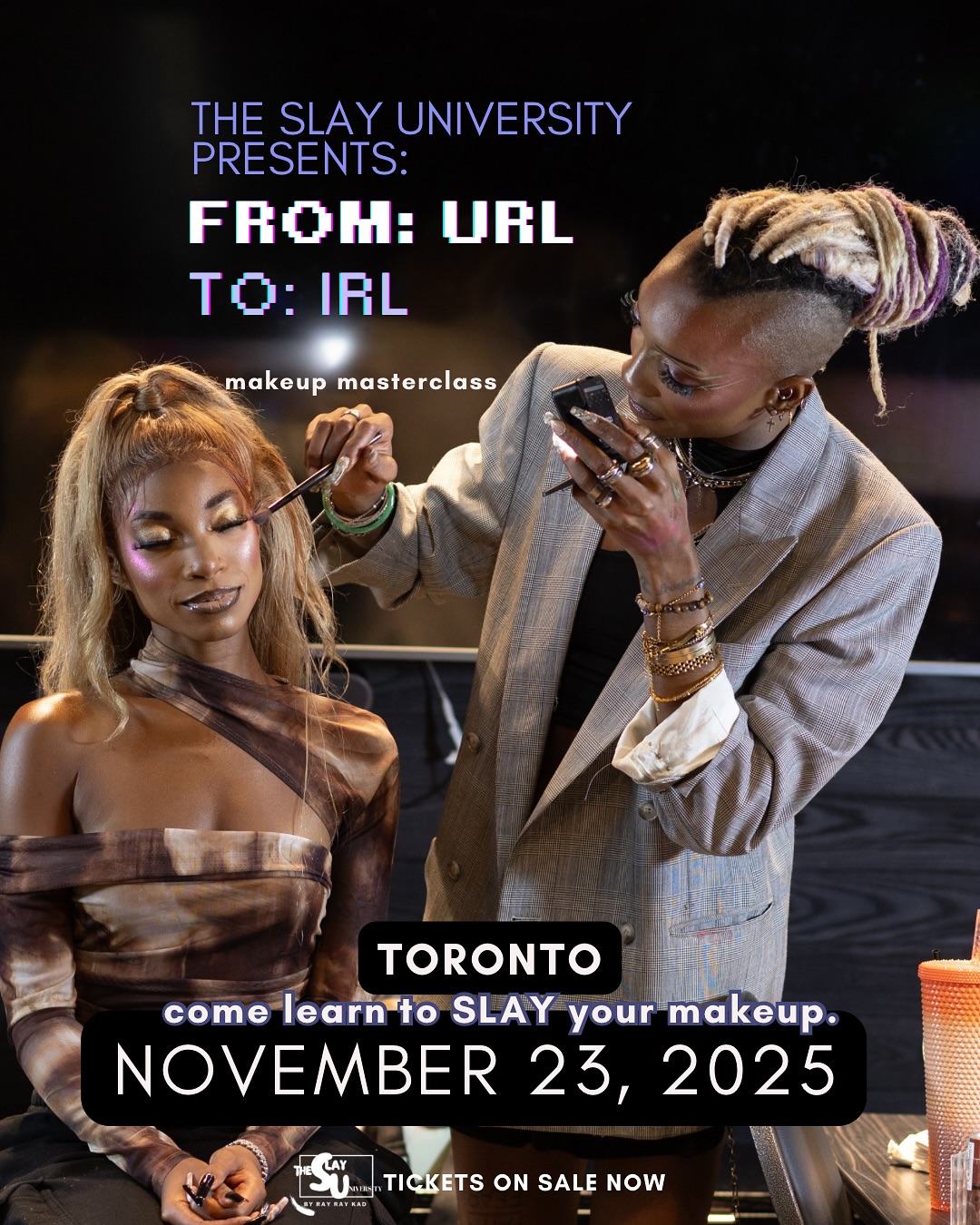 Rayray Kad applies makeup to a model during a live masterclass, promoting the Toronto Slayversary Makeup Class.